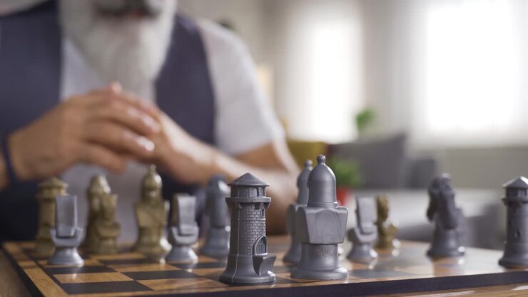 Clever man playing chess alone.