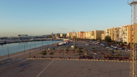witness the majestic sunrise over the bustling port of algeciras, a jewel of andalusia, spain, in this breathtaking aerial view.