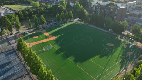 aerial view pushing towards the bobby morris playfield in seattle's cal anderson park