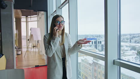 businesswoman on a call in modern office