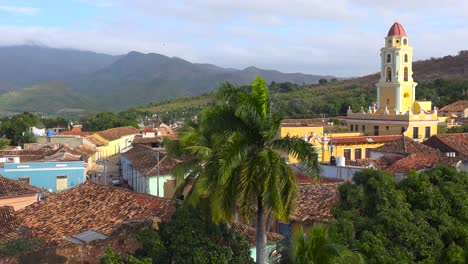 a beautiful overview of the town of trinidad cuba with the church of the holy trinity visible 1