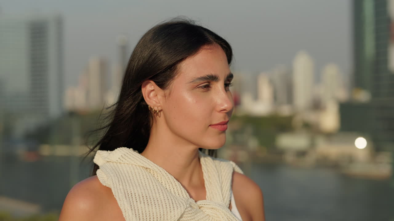 Smiling Woman in Cityscape