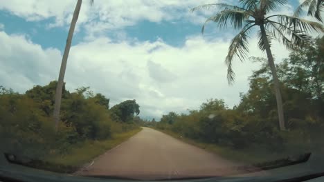 riding on the road in thailand with the car