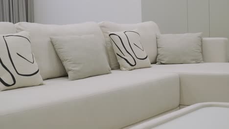 modern living room with white sectional sofa