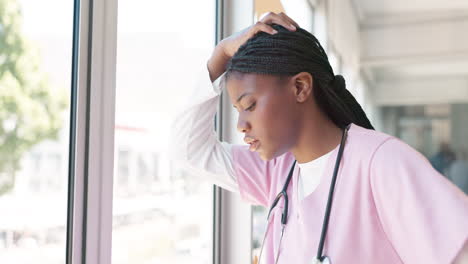 doctor, woman and burnout by window with stress