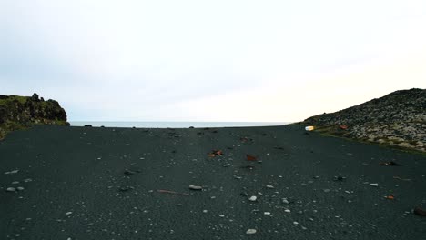 aerial view of black volcanic ash beach in iceland, mysterious atmosphere