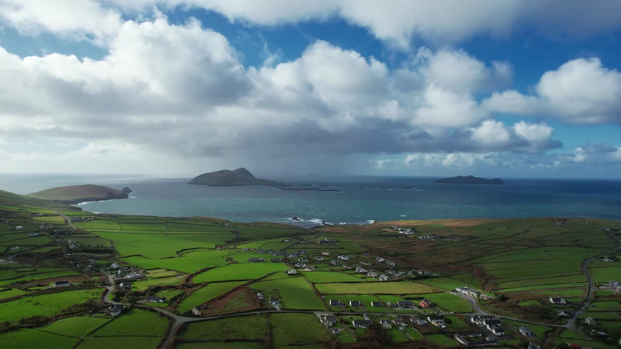 drone rising epic Irish Landscapes Dounquin and The Blasket Islands in Autumn shower over the Islands Kerry Epic Locations