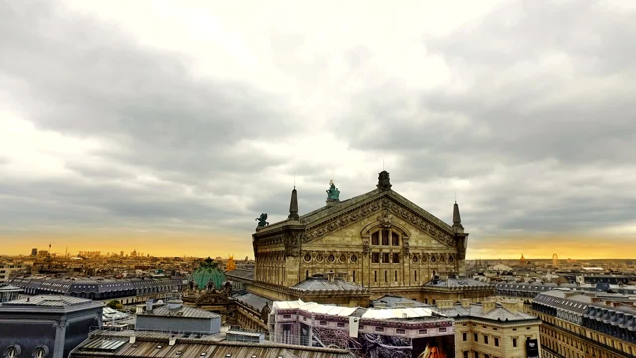 Paris, Sunrise panorama cityscape view of palais garnier from galerie lafayette rooftop