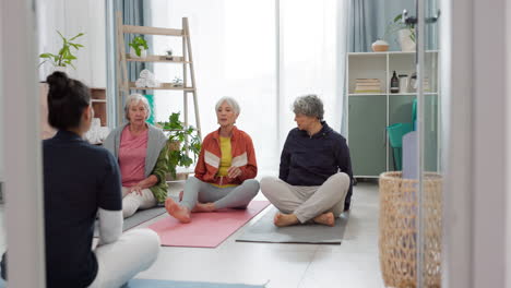Senior-women,-start-yoga-and-coach-talking