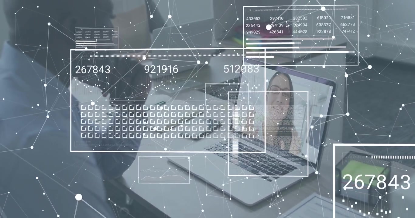 Mannlig kontorarbeider starter forretningssamtale, viser pulserende nettverksoverlegg som oppdaterer datapaneler.