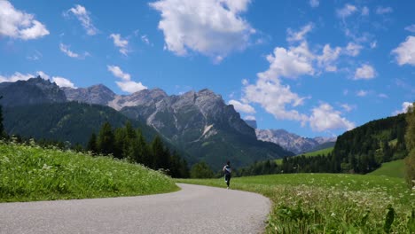 Woman-jogging-outdoors.-Italy-Dolomites-Alps