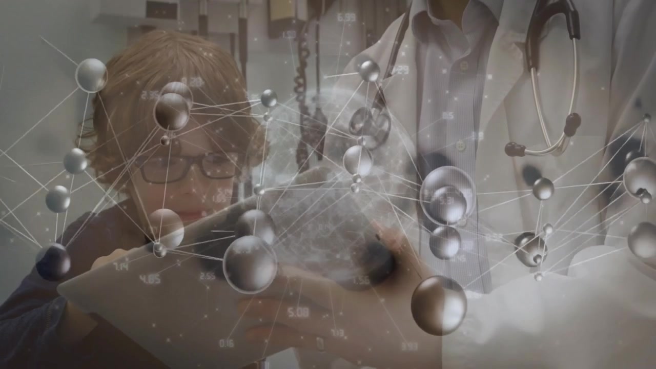 Doctor and Young Patient Using Tablet in Hospital