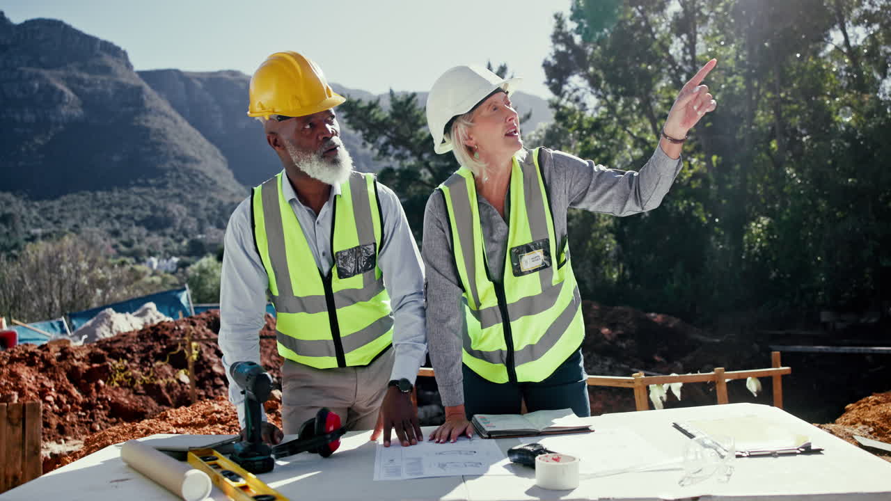 Construction Workers Discussing Building Project Plans