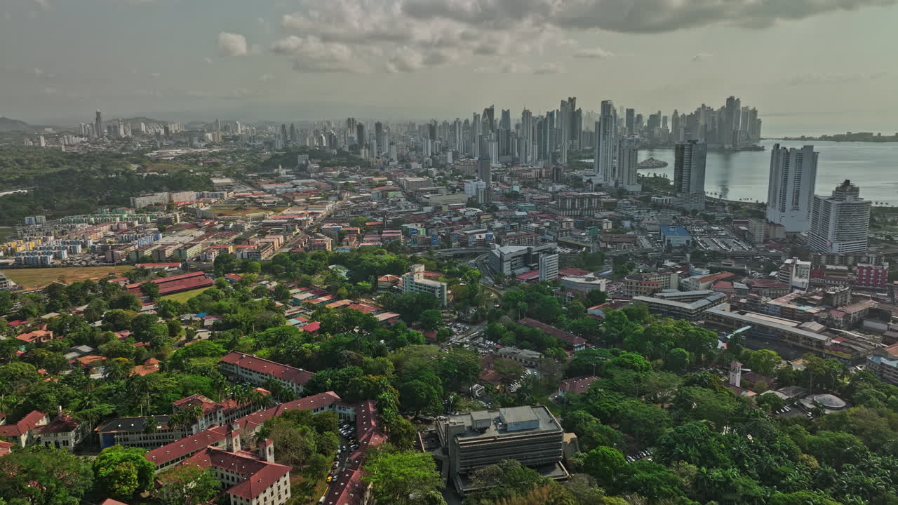 Panama City Aerial v69 cinematic drone flyover ancon hill above san miguel neighborhood with urban downtown cityscape in the background at daytime - Shot with Mavic 3 Cine - March 2022