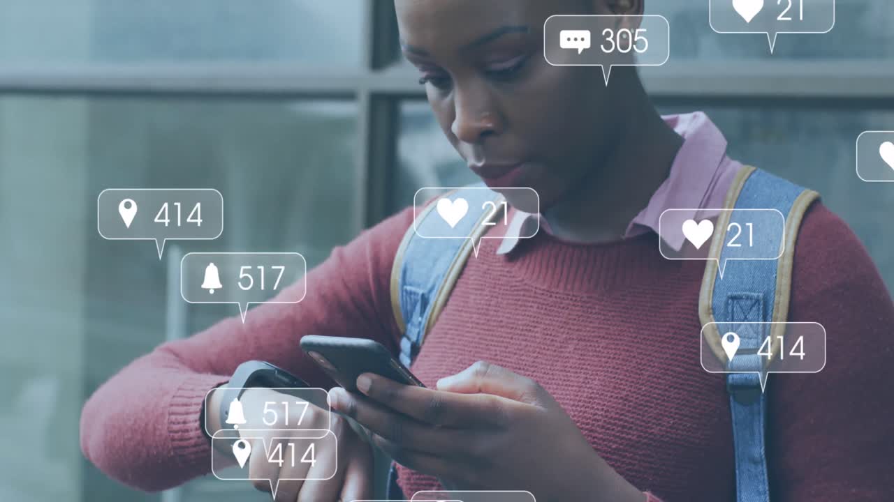 Animation of social media icons with numbers over african american woman using smartphone