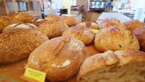 freshly baked artisan bread on display in bakery