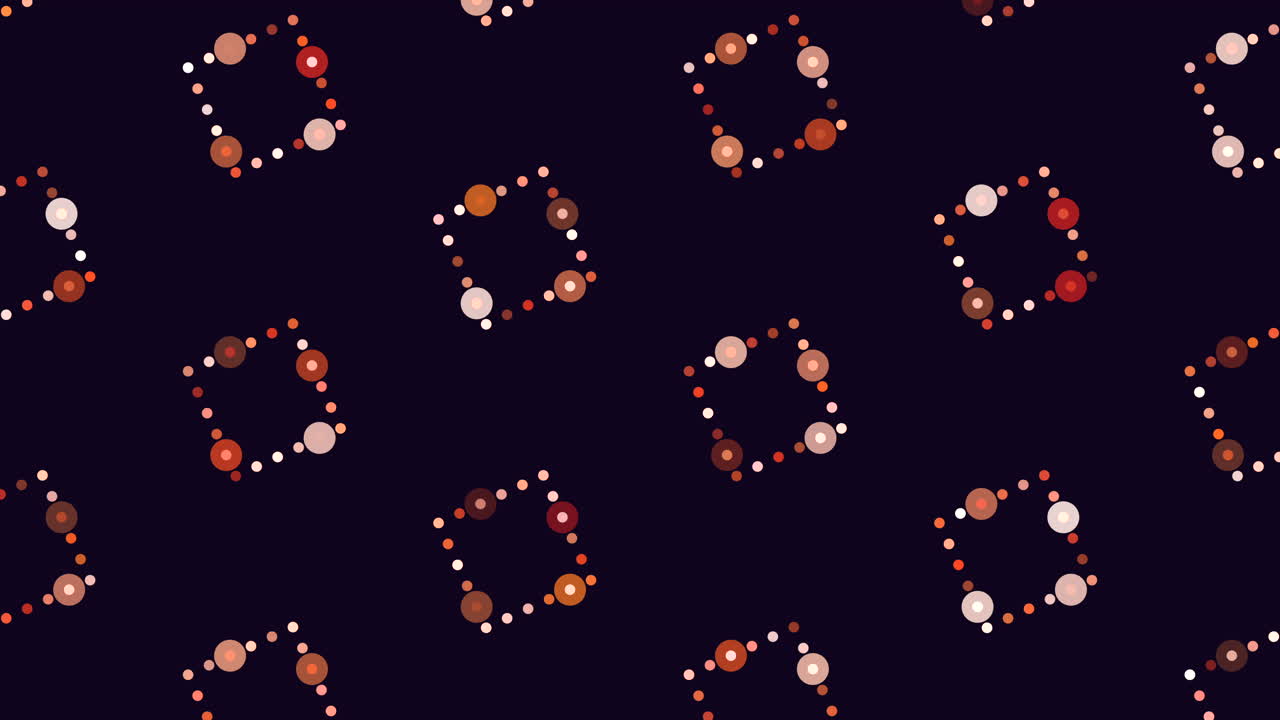 산란한 다채로운 점들이 복잡한 원형 패턴을 형성합니다.