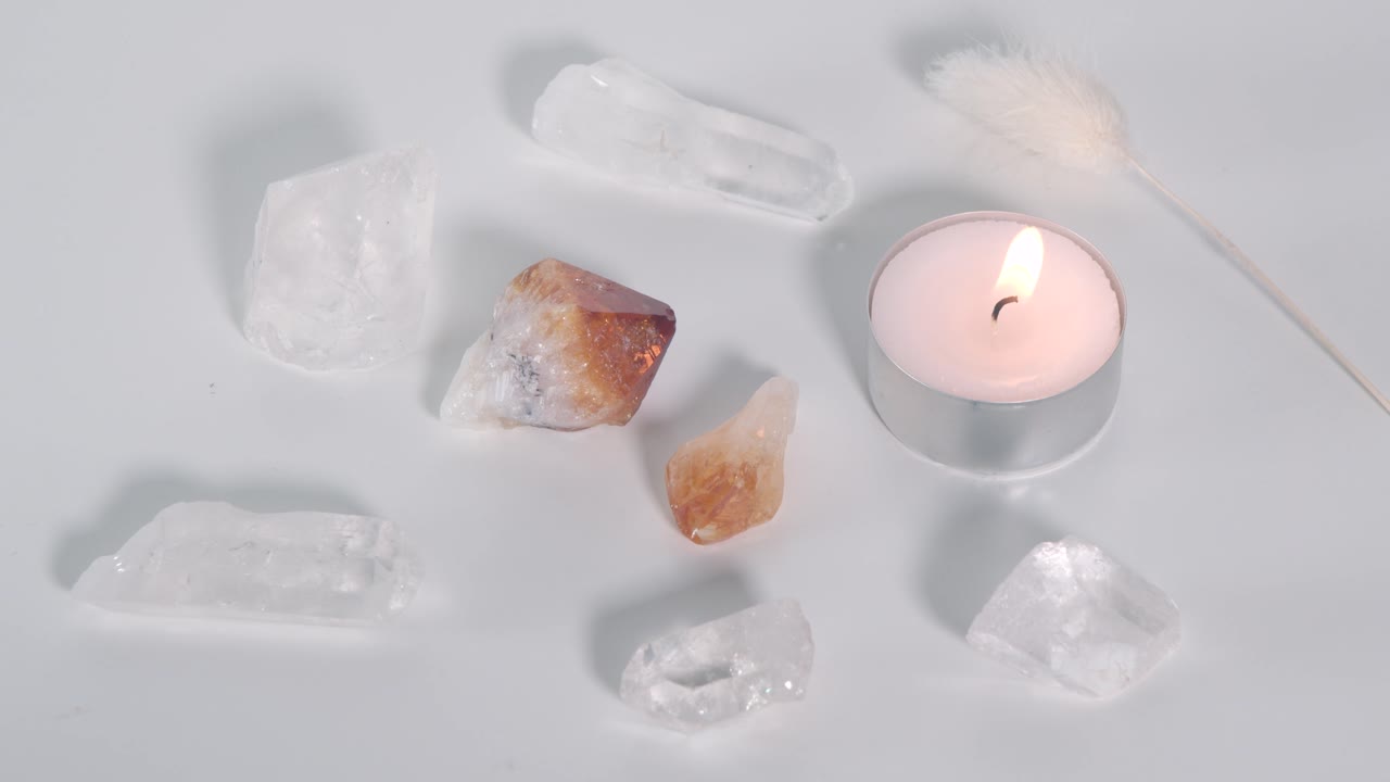 Citrine and clear quartz with a candle