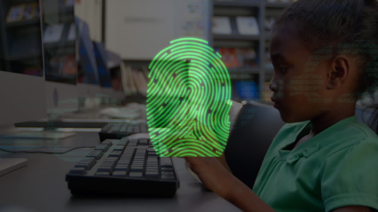 Bio metric fingerprint scanner against boy using computer