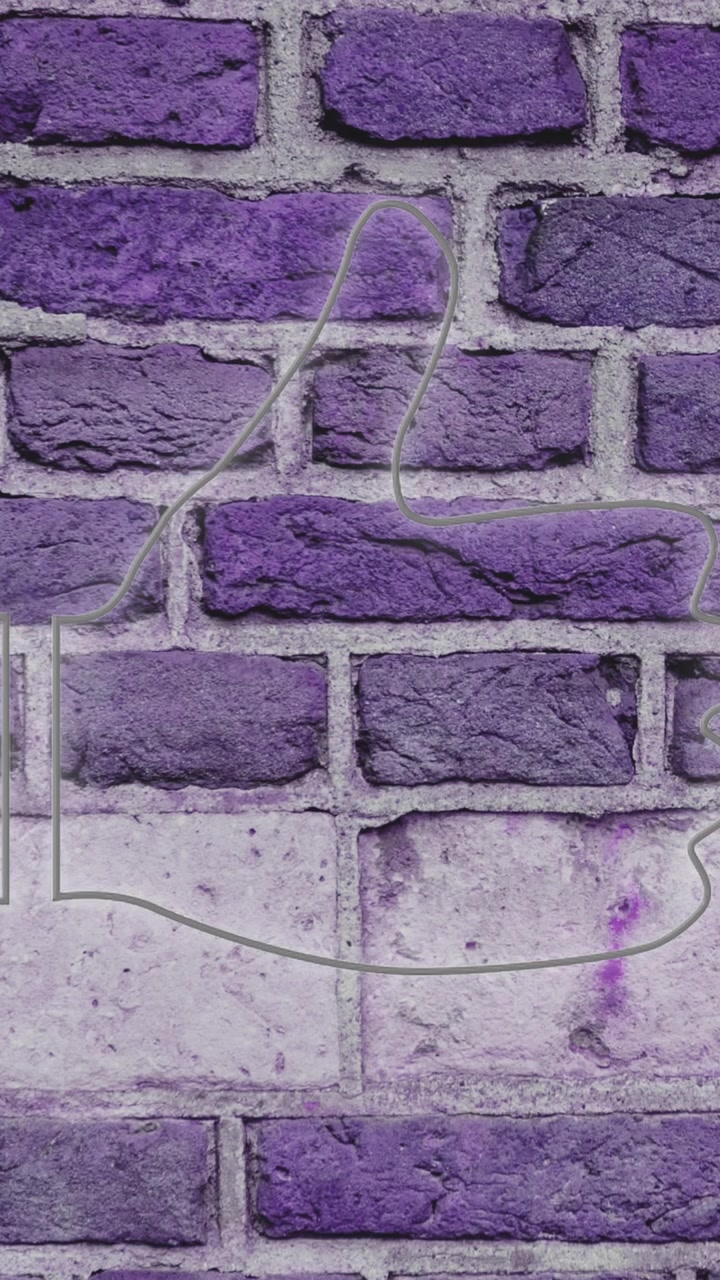 Thumbs down neon sign on brick wall 4k