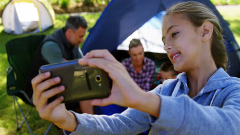 girl taking a selfie on mobile phone