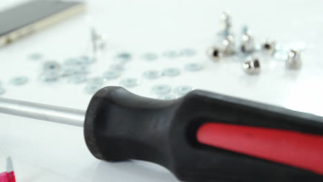 close-up of screwdriver and screws