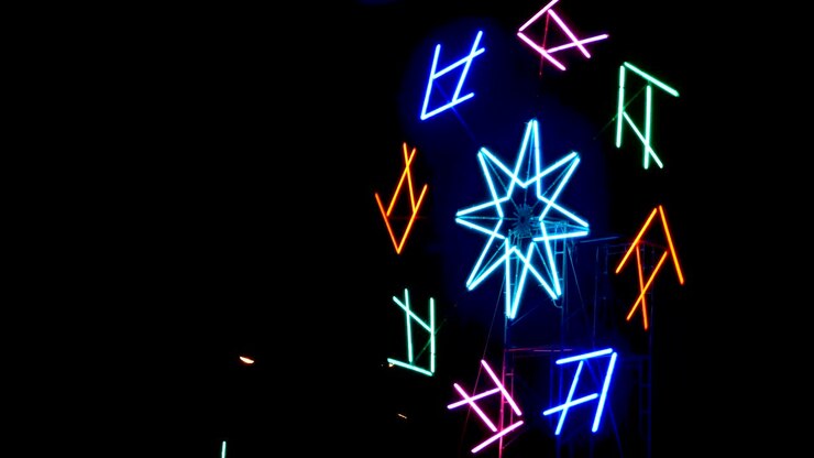 Neon fish light is spinning