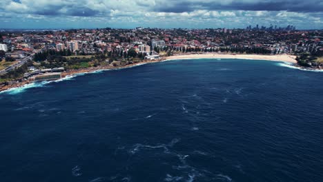 coogee beach, drone flys towards coogee beach, australia