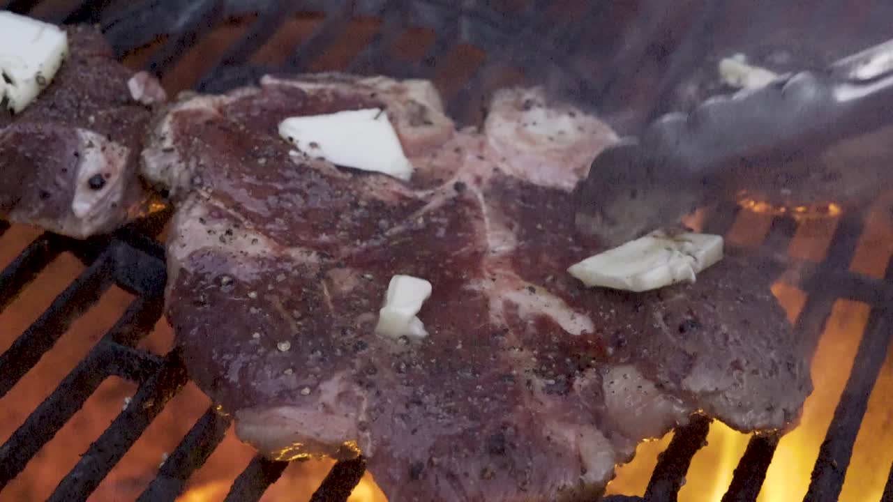 Steak Grilling with Butter on the Grill