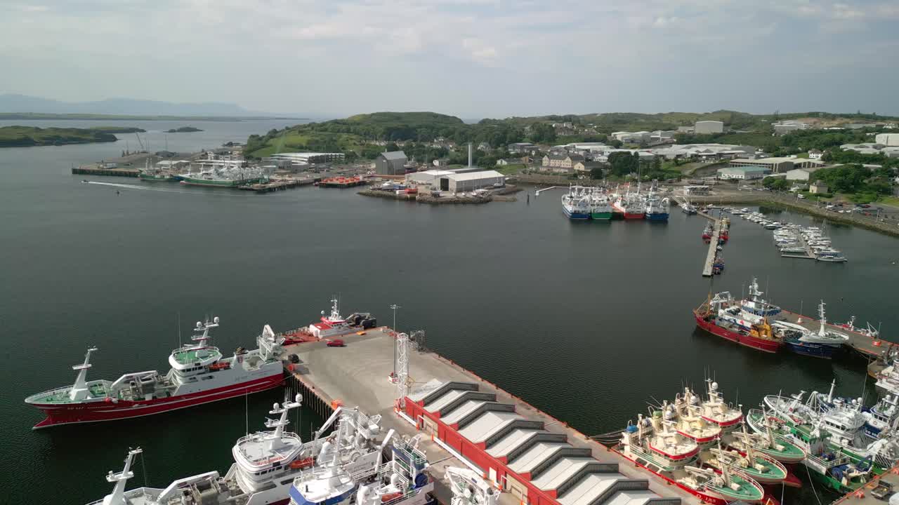 Wide advancing aerial video of Killybegs Harbour on the Wild Atlantic Way in County Donegal, Ireland. Filmed in 4K, 60FPS and with Rec709 color.