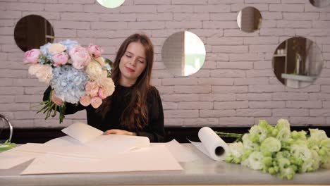 a skilled floral designer passionately arranges stunning bouquets in an inspiring creative workshop