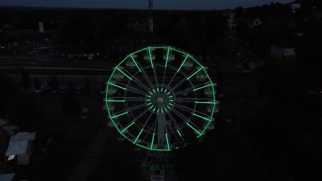 Aerial-view-of-Ferris-Wheel-Lit-at-Night