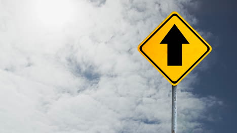 animation of road sign with arrow over clouds