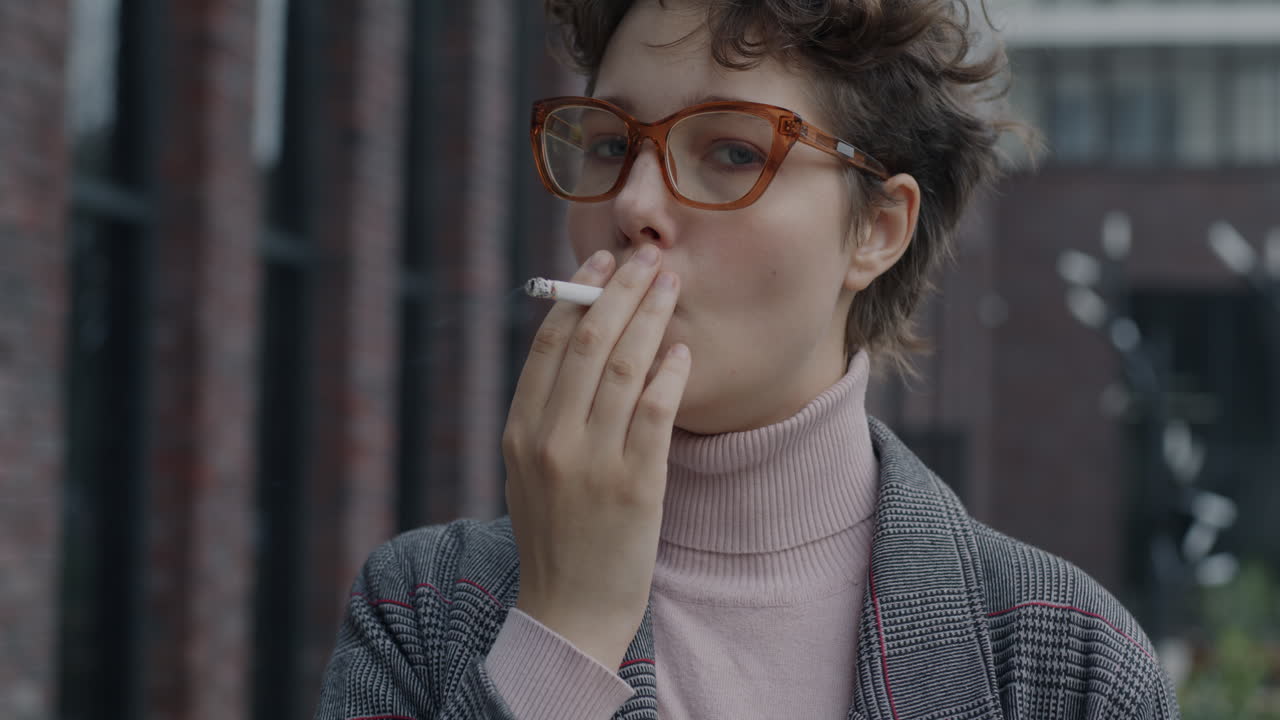 Young Woman Smoking Outdoors