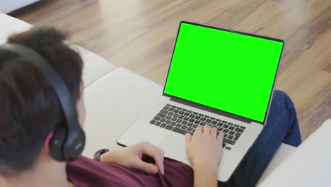 Animation-of-asian-boy-having-online-lessons-on-laptop-with-copy-space