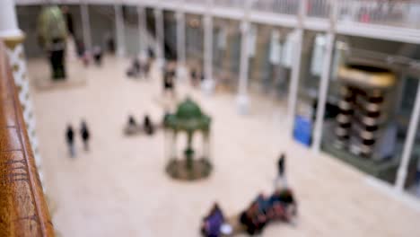 people exploring the museum's main hall