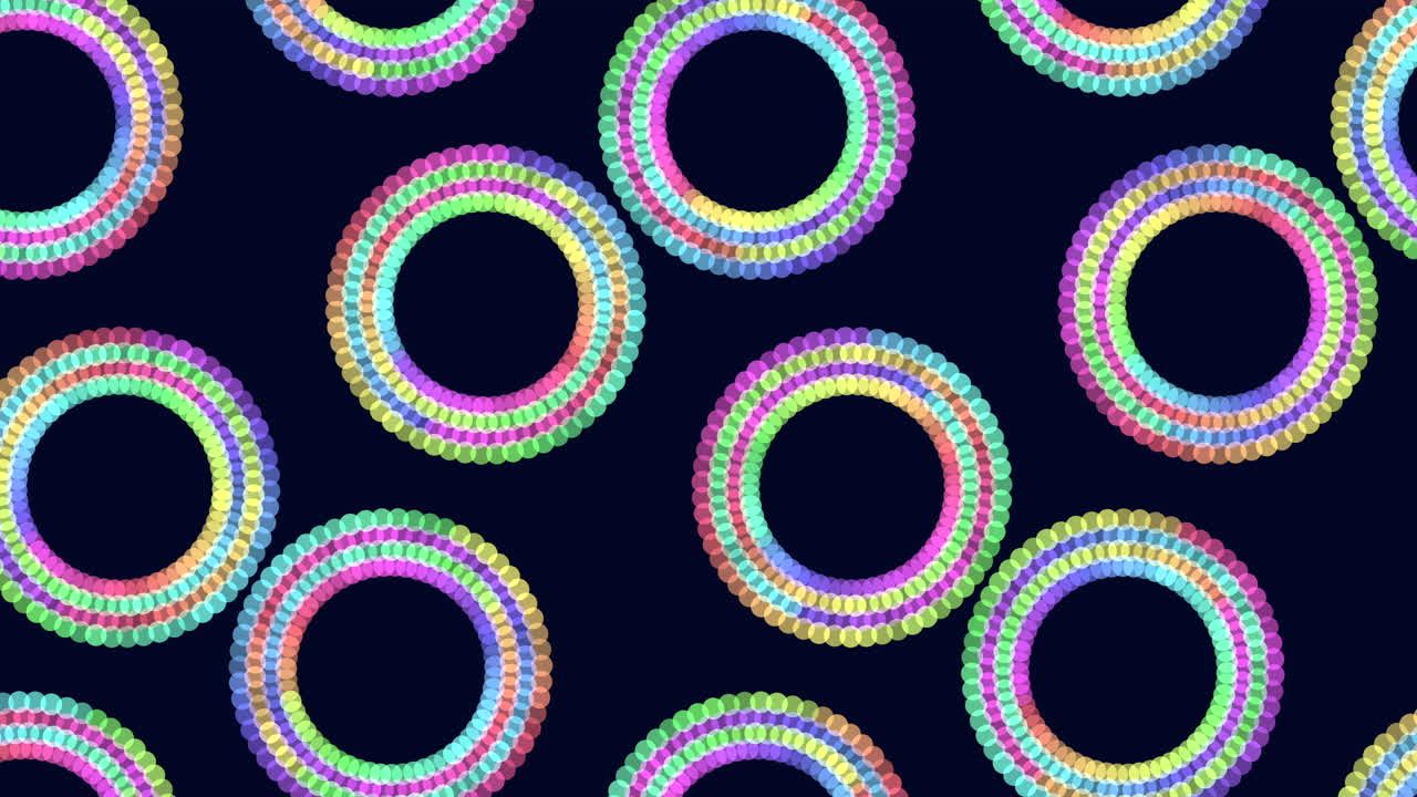 Vibrant circles on a black backdrop create a captivating circular pattern. The arrangement of brightly colored circles, some overlapping, offers an energetic and visually appealing display