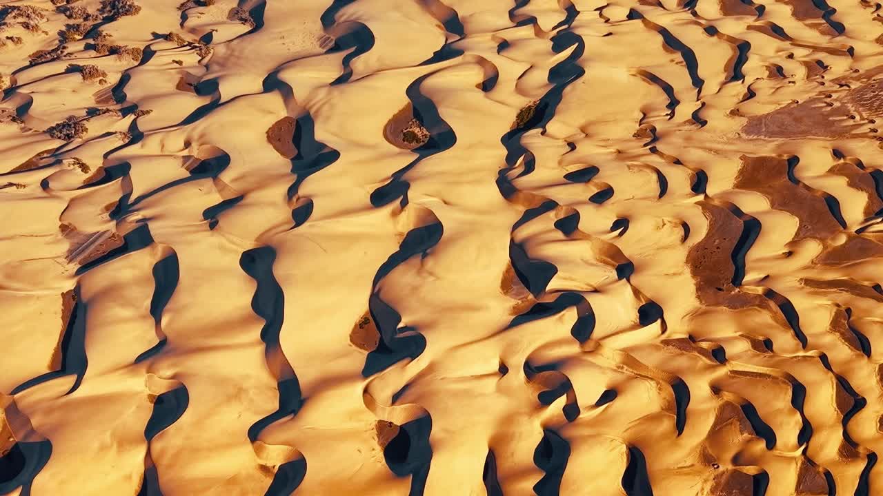 Waves of sand form patterns on the dunes in Gran Canaria, Spain