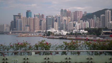 the lively harbor of hong kong showcases a breathtaking skyline filled with towering skyscrapers and bustling waterfront activities