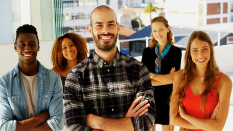 Group-of-colleagues-standing-with-arms-crossed