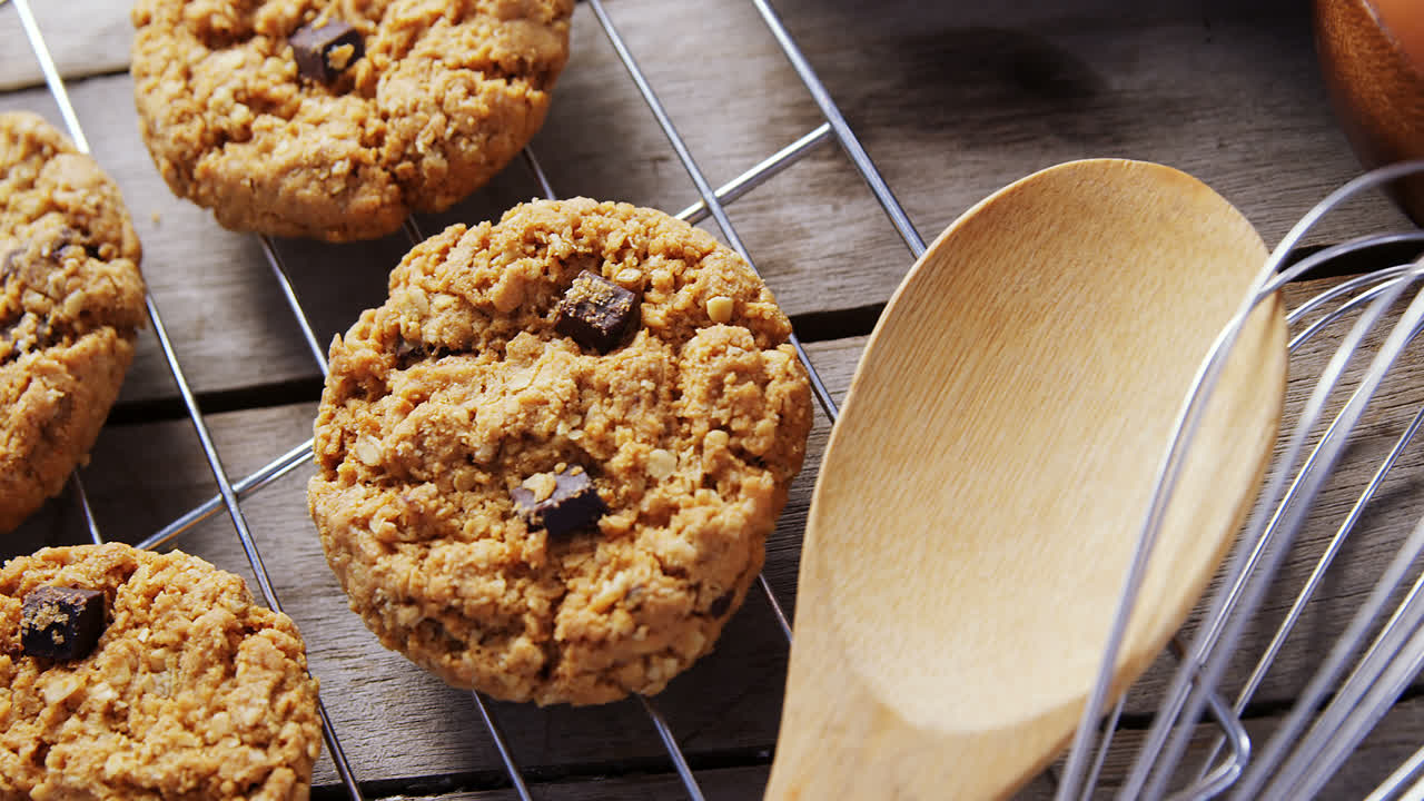 Fresh baked cookies kept over a cooling rack 4k