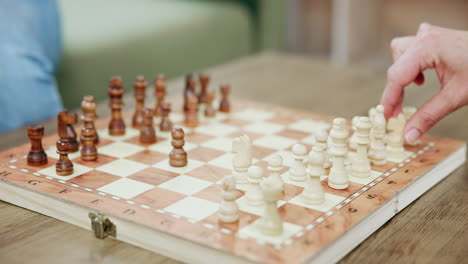 Chess,-hands-and-knight-in-a-home-with-pawn