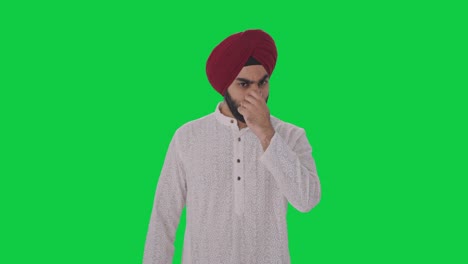 Disgusted-Sikh-Indian-man-frustrated-by-bad-smell-Green-screen