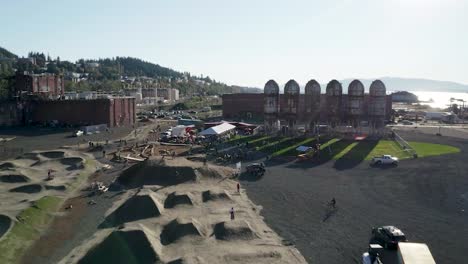 Cyclists-Riding-Bicycles-In-Kulshan-Trackside-Beer-Garden-In-Washington---Aerial-shot