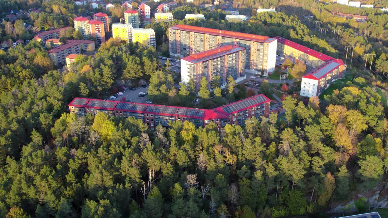 Aerial: Fastlagsgatan apartment block in Kortedala district during the day in Gothenburg, Sweden, orbit drone shot
