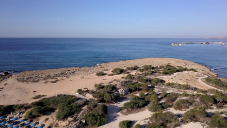 Aerial-shot-of-the-seacoast-and-the-beach-at-a-holiday-resort