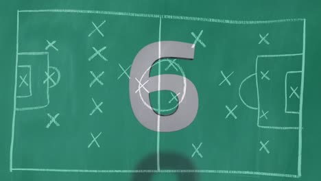cuenta atrás contra el boceto del campo de fútbol 4k