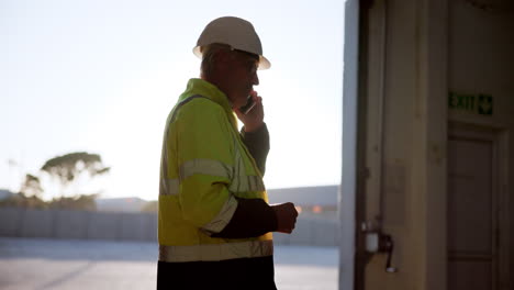 construction worker talking on phone