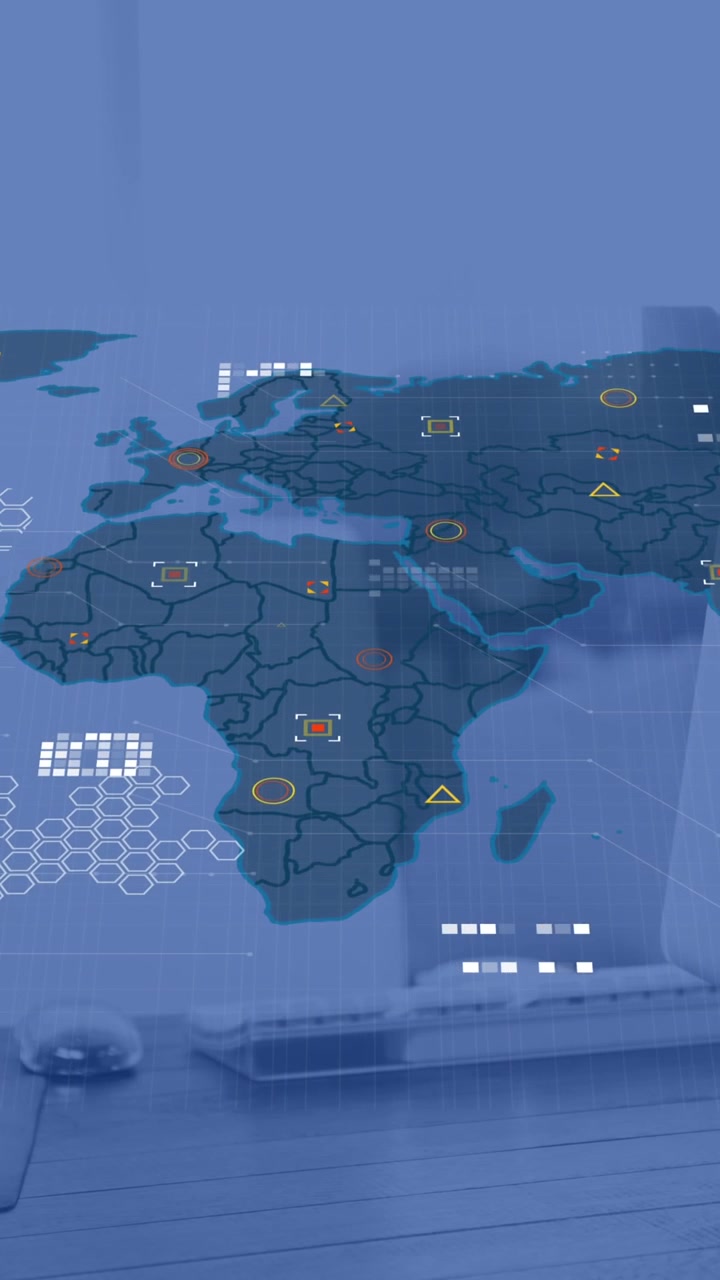 Animation of world map and data processing against office desk
