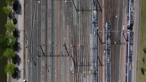 Top Down Aerial View of Train Entering Helsinki Central Station, Finland